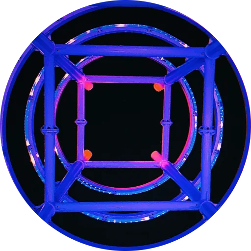 The WelcomeCarson logo: glowing purple rings and a cube frame